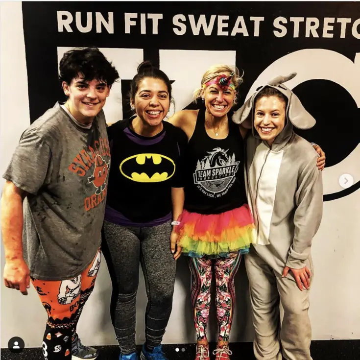 Group of clients in costume after a workout at Phys. Ed. KC