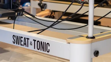 A pilates reformer at sweat & tonic