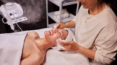 A woman at the spa receiving a treatment.