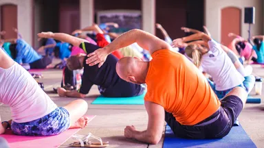 People taking a yoga class.