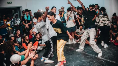 A group of people dancing during a class